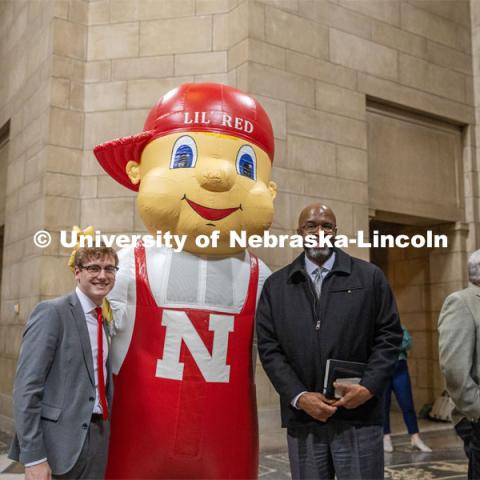Student Body President and Student Regent, Paul Pechous (left), poses with Lil Red and Chancellor Rodney Bennett at the I love NU Day event in the Rotunda of the Nebraska State Capitol. March 6, 2024. Photo by Kristen Labadie / University Communication.